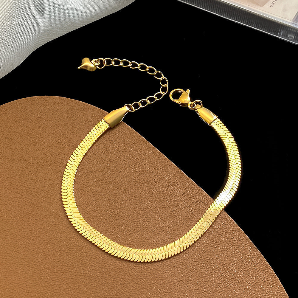 14K Gold Liquid Ribbon | Handcrafted Herringbone Bracelet